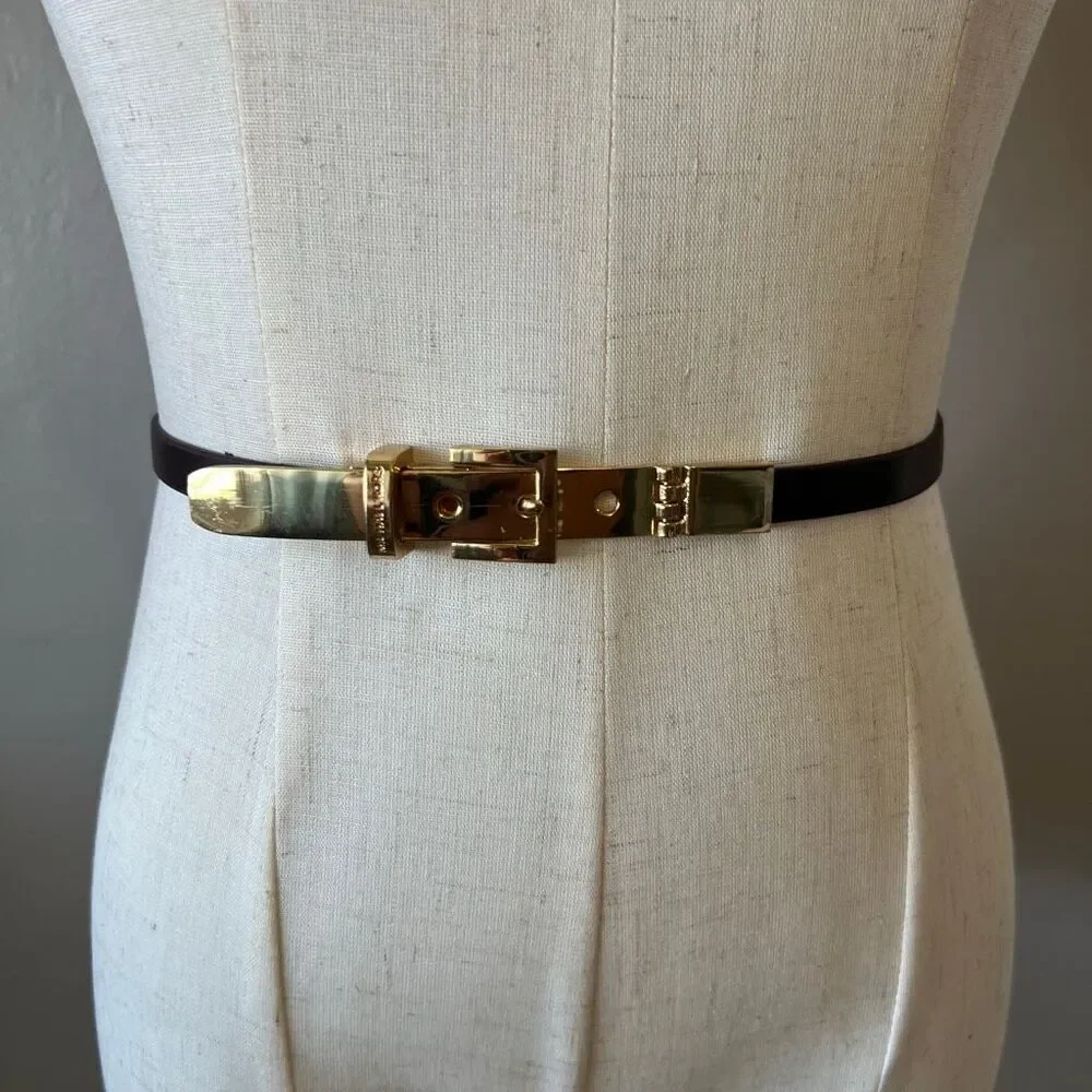 Michael Kors brown skinny belt featuring a polished gold-tone buckle